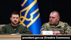 Ukrainian President Volodymyr Zelenskiy (left) at the appointment of Vasyl Malyuk (right) to the leadership of the Security Service of Ukraine, in Kyiv on February 13, 2023.