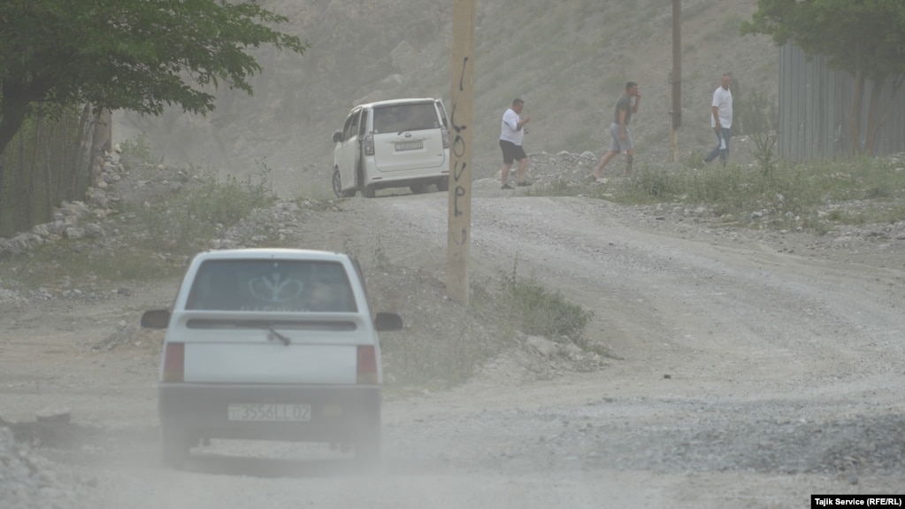 A road in Shing, near Zarafshon. Heavy vehicles working at the mine regularly drive on this road and cause damage that is not repaired.