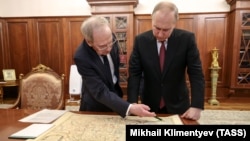 Председатель Конституционного суда Валерий Зорькин и президент России Владимир Путин, 23 мая 2023 года