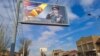 Рекламный щит в поддержку национальной армии на ведущем в аэропорт «Звартноц» проспекте Адмирала Исакова. Форма армянского офицера мало чем отличается от прежней советской, 15 февраля 2022 года