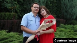 Мобилизованный Владимир Фролов и его жена Анна Булгакова