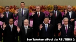 Мировые лидеры, включая китайского президента Си Цзиньпиня и российского президента Владимира Путина во время саммита инициативы «Один пояс, один путь». Пекин, 18 октября 2023 года