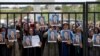 Members of the MEK protest on June 20 in Tirana after Albanian police raided a camp.