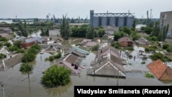 Затопленная после повреждения Каховской ГЭС территория в Новой Каховке, 7 июня 2023 года