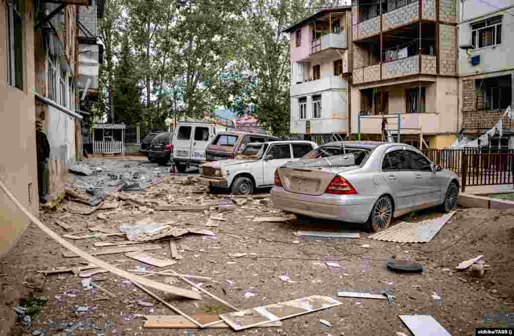 Damage is seen in a residential area after a military strike on Stepanakert. The de facto human rights ombudsman in the ethnic Armenian-controlled Azerbaijani region said&nbsp;early on September 20 that 32 people had been killed, including seven civilians, two of them children, and more than 200 wounded as a result of shelling, although some death estimates put the death toll considerably higher.