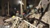 Rescue workers attend the site of an explosion in western Iran on March 12. 