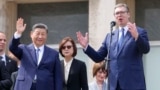 Xi Jinping (left) looks on as Serbian President Aleksandr Vucic speaks at the Palace of Serbia on May 8 during the Chinese leader's two-day visit to Belgrade.