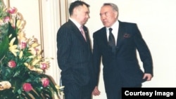 Nursultan Nazarbaev with his son-in-law and then-deputy chief of national security Rakhat Aliev in 2001. The pair later fell out and Aliev penned a book called Godfather-In-Law that depicted Nazarbaev as a ruthless, mafia-style enforcer. Aliev died suspiciously in an Austrian prison in 2015 while awaiting trial on murder charges. Photo taken from Godfather-In-law.