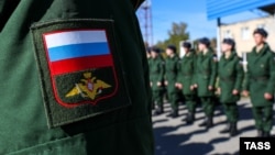 Conscripts gather at the Rostov-on-Don region's army recruitment office in the city of Bataysk before departing for military service in October 2023.