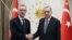 Turkish President Recep Tayyip Erdogan (right) meets with NATO Secretary-General Jens Stoltenberg in Ankara on February 16. 