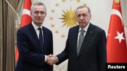 NATO Secretary-General Jens Stoltenberg (left) meets with Turkish President Recep Tayyip Erdogan in February in Ankara.