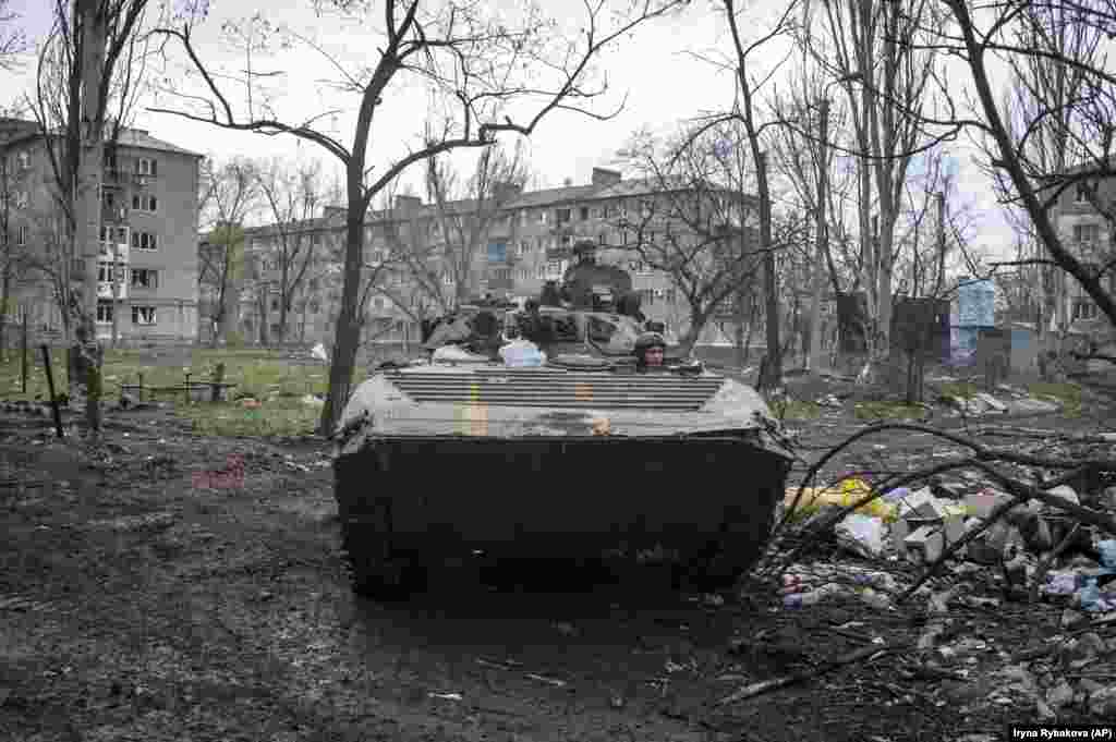 Ukrainian soldiers driving an armored personnel carrier in Bakhmut on April 12. A report published on the same day this photo was taken describes Ukrainian forces defending a &ldquo;shrinking half-circle of ruins in a western neighborhood of Bakhmut.&quot;&nbsp;However a map from the same New York Times report shows a significant portion of the center of the city still under Ukrainian control. &nbsp;