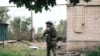 Український поліцейський під час евакуації із Вовчанська, 13 травня 2024 року