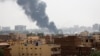 Smoke rises from burning aircraft inside Khartoum Airport during clashes between two military factions in Khartoum on April 17. 