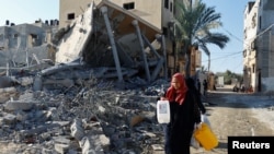 Последствия израильских воздушных ударов по городу Хан-Юнис на юге сектора Газа. 15 октября 2023 года
