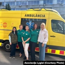 Doctors from thee Lviv Regional Clinical Perinatal Center operate a mobile gynecological clinic donated by the Lithuanian NGO Lygiai.