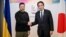 Ukrainian President Volodymyr Zelenskiy (left) and Japanese Prime Minister Fumio Kishida meet after a G7 leaders' meeting in Hiroshima, Japan, on May 21.
