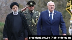 Iranian President Ebrahim Raisi (left) and Belarusian ruler Alyaksandr Lukashenka in Tehran on March 13.