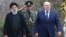 Iranian President Ebrahim Raisi (left) and Belarusian ruler Alyaksandr Lukashenka in Tehran on March 13.