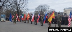 O paradă a trupelor NATO la Riga, în martie 2024, marchează cea de-a 20-a aniversare a aderării Letoniei la alianță.