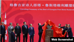 Garibashvili and a delegation of Georgian officials unveil a bust of Georgian poet Shota Rustaveli at the Beijing Language and Culture University during a visit in July.