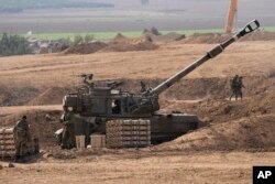 Izraelska mobilna artiljerijska jedinica na položaju u blizini granice između Izraela i Gaze, 28. oktobra