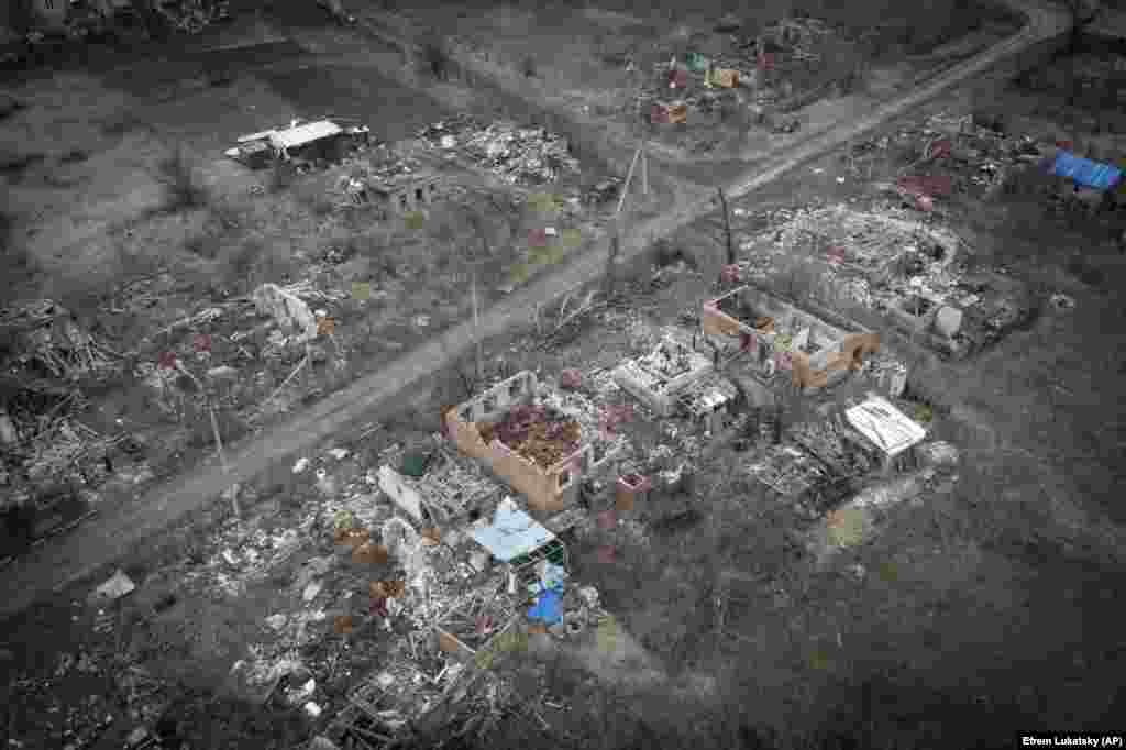  An aerial view of houses damaged during fighting with Russian troops in the village of Kamenka, Kharkiv region, Ukraine. 