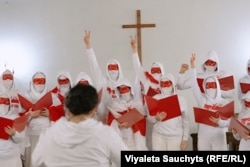 Belarus's Free Choir in Exile performs at the Evangelical Reformed Church in Vilnius on March 25 to mark the 106th anniversary of their country's declaration of independence.