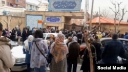 Families protest in Tehran on March 5.