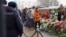 Hundreds Visit Navalny's Grave Under Police Surveillance