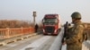 Turkey/Armenia - An Armenian truck loaded with humanitarian aid for earthquake victims crosses a Turkish-Armenian border bridge near Margara, February 11, 2023.