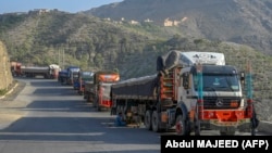 Pakistan began requiring the crew of commercial vehicles to have passports and visas to enter, and Afghanistan responded by refusing to allow any trucks to pass. (file photo)