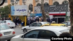 People protest in Tehran about a wave of mysterious illness that has affected schoolchildren across the country. 