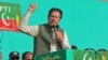 Former Pakistani Prime Minister Imran Khan addresses supporters of his Pakistan Tehrik-e Insaf (PTI) party during a public rally in Abbottabad in May 2022. 