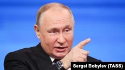 Russian President Vladimir Putin speaks at a televised question-and-answer session on December 14.
