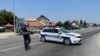 Police close the road to Lipnicki Sor in Loznica on July 18.