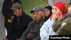 Relatives of the rangers meet with President Qasym-Zhomart Toqaev in the Abai region on June 11.