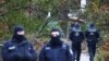 Policija osigurava područje nakon što je 25 osumnjičenih članova i pristaša krajnje desničarske skupine privedeno tokom racija diljem Njemačke, 7. decembar 2022. 