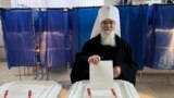 Митрополит Никон голосует на выборах президента России. 15 марта 2024 года