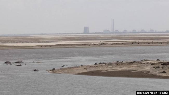 Каховське водосховище біля Нікополя, по той бік окупований Енерегодар, весна 2024 рік