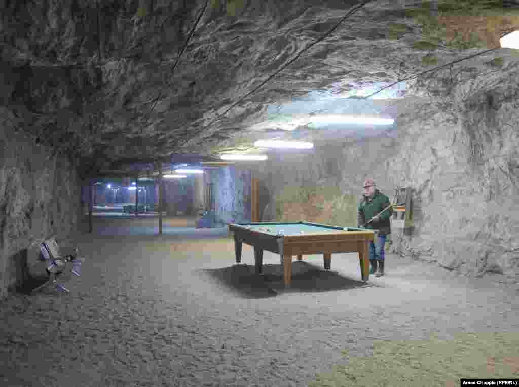Avetesian plays pool inside the hospital, 235 meters beneath Yerevan. The veteran underground worker says explorations were first made in the Yerevan suburb of Avan in the 1940s as Soviet authorities were searching for the same kind of oil deposits that had made Baku a boomtown in the early 1900s.