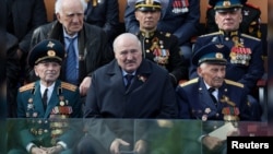 Belarusian leader Alyaksandr Lukashenka (center, file photo)