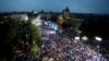 Supporters of Serbian President Aleksandar Vucic take part in a rally in support of his policies and the ruling Serbian Progressive Party in Belgrade on May 26.