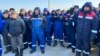 Workers of the West Oil Software company rally at the Zhetibai oil field in the Manghystau region on December 15.