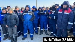 Workers of the West Oil Software company rally at the Zhetibai oil field in the Manghystau region on December 15.