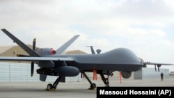 O dronă americană MQ-9 Reaper, expusă la un târg aviatic din Afganistan. 