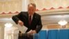 Former Kazakh President Nursultan Nazarbaev votes during the parliamentary election in Astana on March 19.