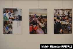 The exhibit features photos of women and children after their rescue at sea.