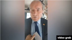 Hakob Aslanian, a member of the parliamentary faction of the ruling Civil Contract party, shown on a video during an incident on a bus in Yerevan. April 15, 2024.
