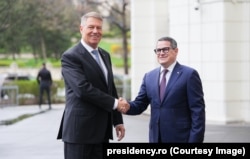 Președintele Klaus Iohannis și Eduard Hellvig, într-o fotografie realizată când cel din urmă era șef al SRI.